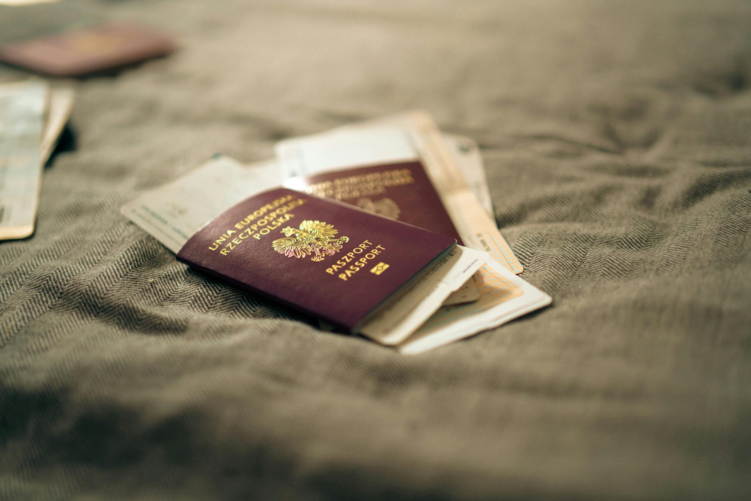 Twonpassports lying on sheet